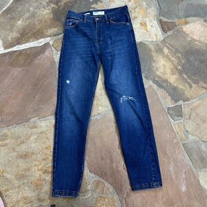 Bershka classic dark-wash skinny jeans with slight distressing details